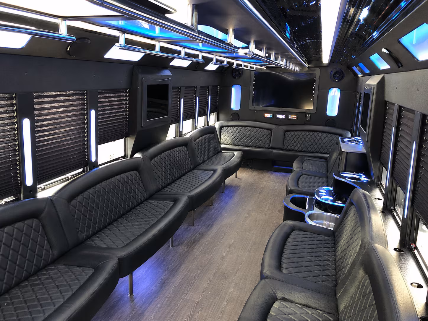 Wedding guests seated inside a party bus serving Irvine